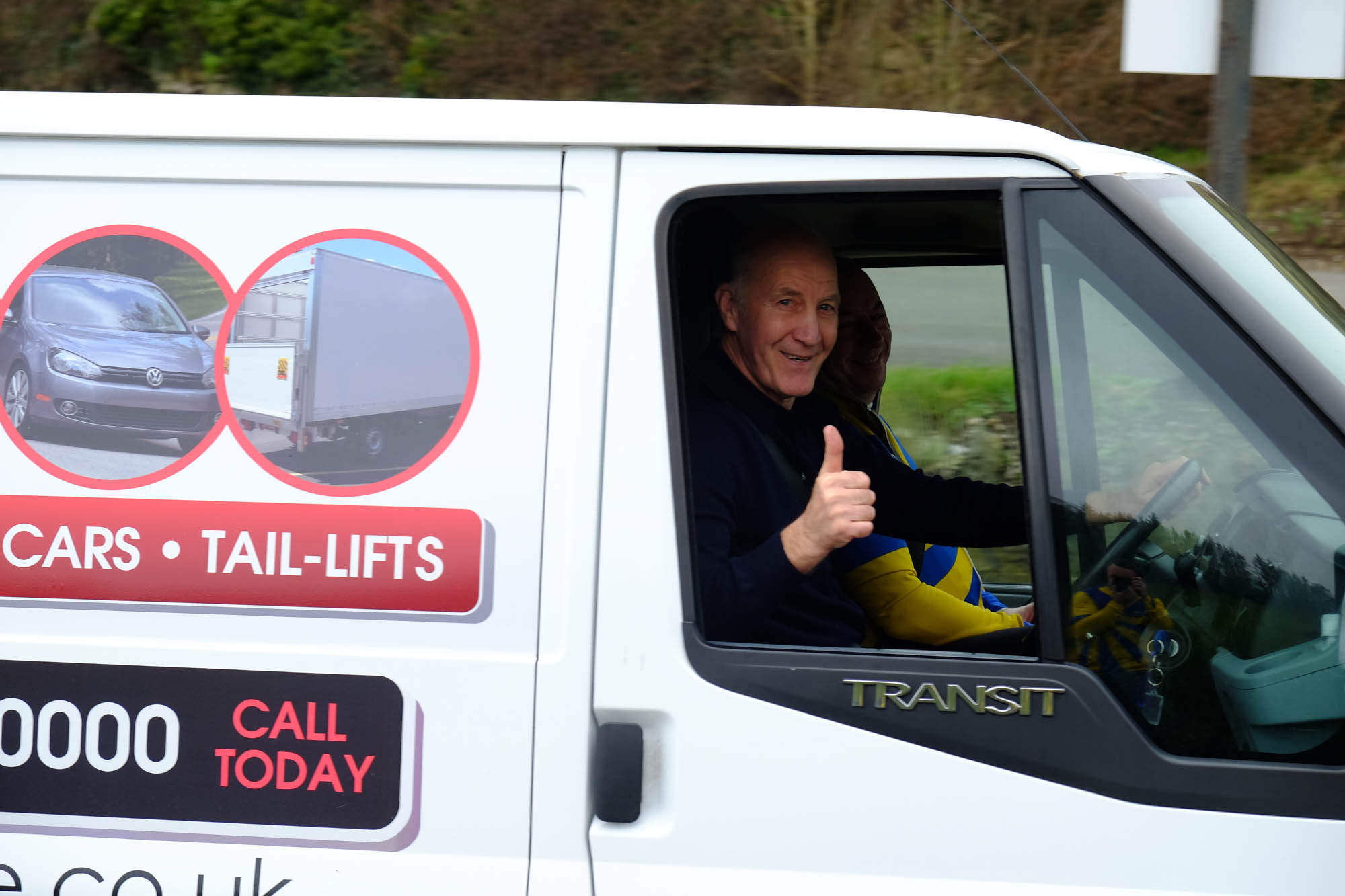 Grim Rimmer in the broom wagon brings up the rear. Smiling happily at his task...
